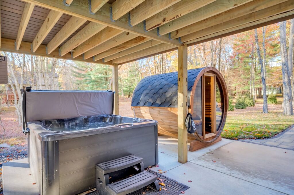 A hot tub and sauna on the patio